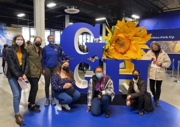 honors students posing in a museum