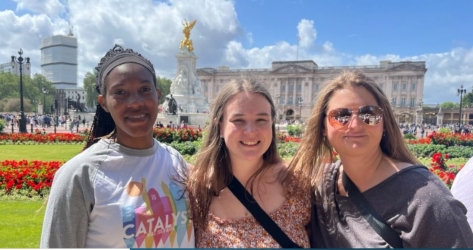 honors students in front of building